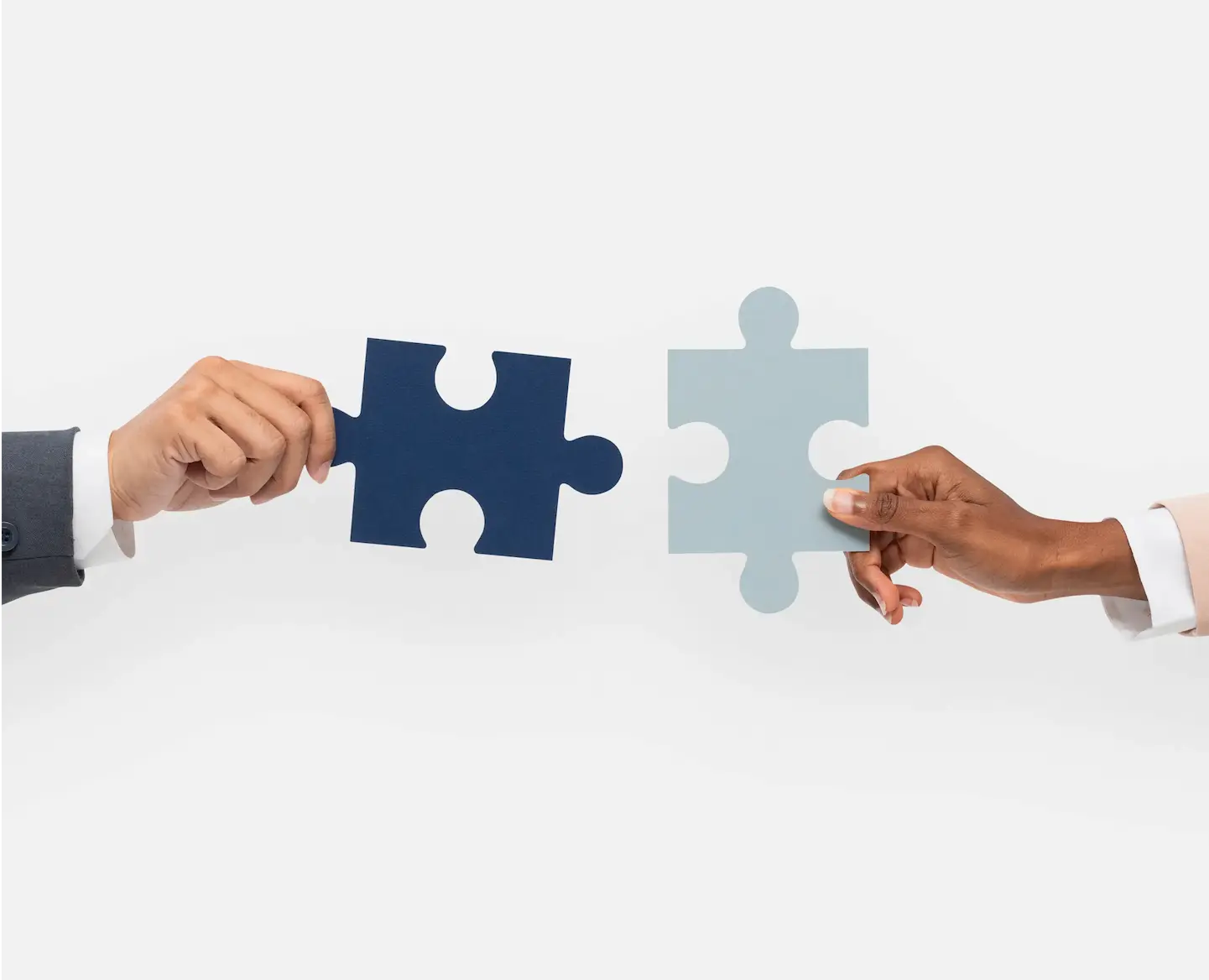 Collaboration and partnership represented by puzzle pieces