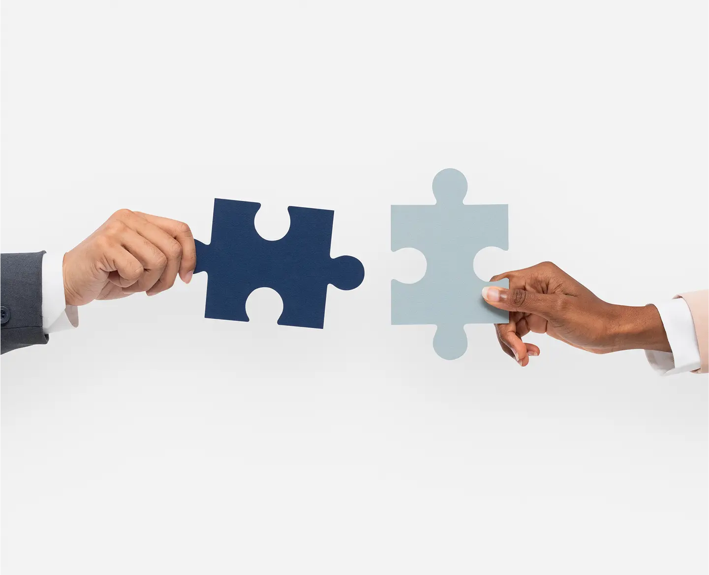 Collaboration and partnership represented by puzzle pieces