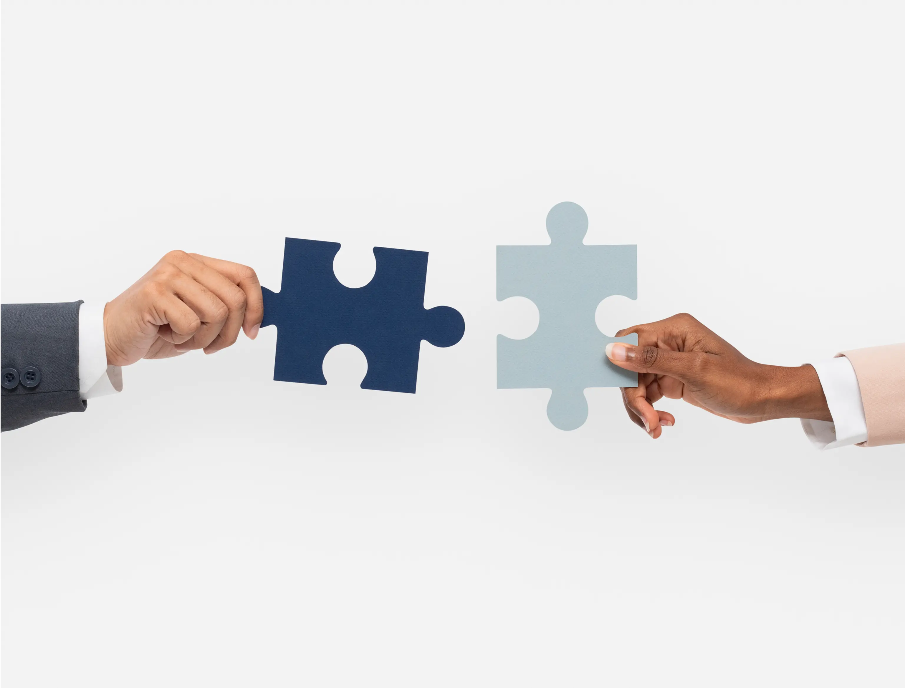 Collaboration and partnership represented by puzzle pieces
